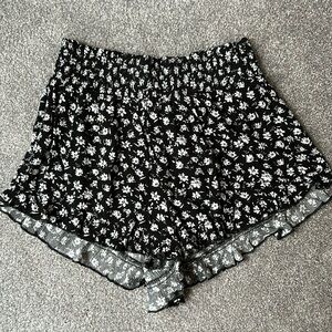 black shorts with white flowers